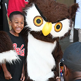  Young boy with Footsie the owl