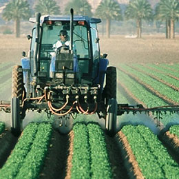 tractor in green field