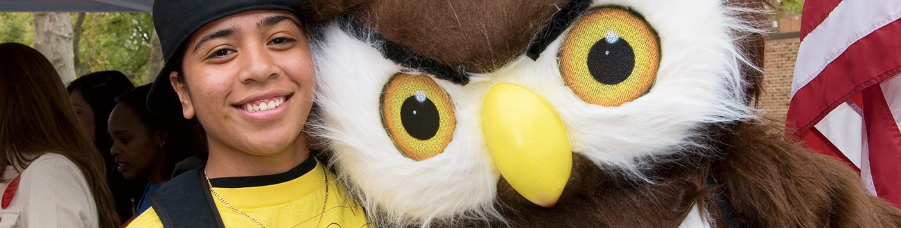 Student with Footsie the Owl